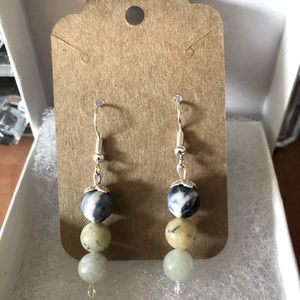 Handmade earrings with multiple color beads.